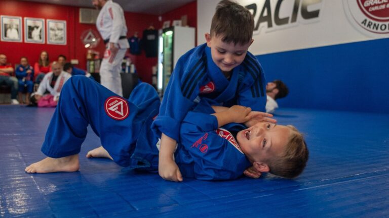 Children practising side control in jiu-jitsu at Gracie Barra Arnold
